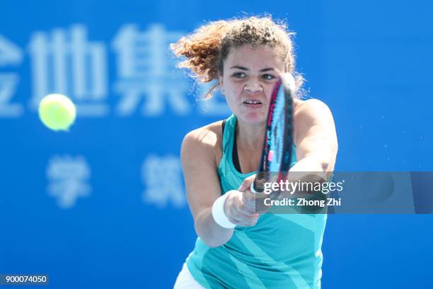 Jasmine Paolini of Italy returns a shot during the match against Jing-jing Lu of China during Day 1 of 2018 WTA Shenzhen Open at Longgang...