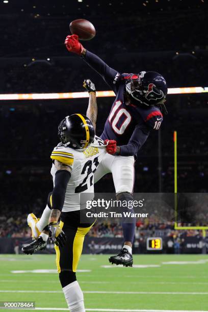 DeAndre Hopkins of the Houston Texans catches a pass for a touchdown in the second half defended by Joe Haden of the Pittsburgh Steelers at NRG...