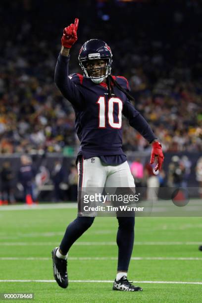 DeAndre Hopkins of the Houston Texans signals as he takes his position before a two point conversion attempt in the second half against the...