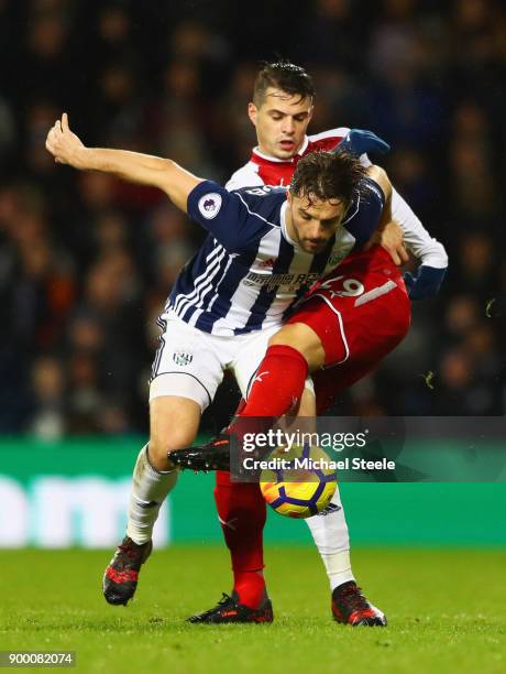 Jay Rodriguez of West Bromwich Albion tangles with Granit Xhaka of Arsenal during the Premier League match between West Bromwich Albion and Arsenal...