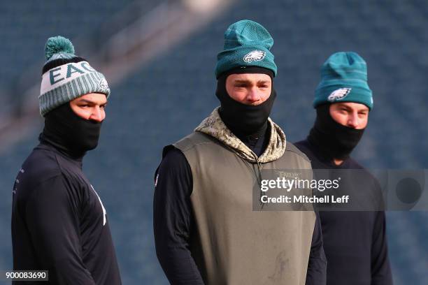 Tight end Trey Burton, tight end Zach Ertz and tight end Brent Celek of the Philadelphia Eagles look on during warmups before playing against the...