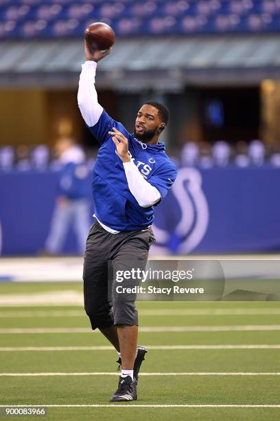Jacoby Brissett of the Indianapolis Colts participates in warmups prior to a game against the Houston Texans at Lucas Oil Stadium on December 31,...