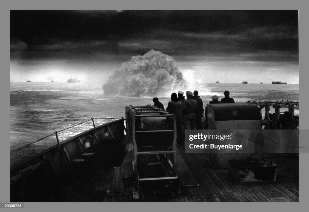 Depth Charges Exploding The crew of US Coast Guard cutter Spencer watch one of their depth ...
