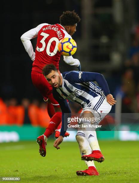 Hal Robson-Kanu of West Bromwich Albion and Ainsley Maitland-Niles of Arsenal battle for the ball during the Premier League match between West...