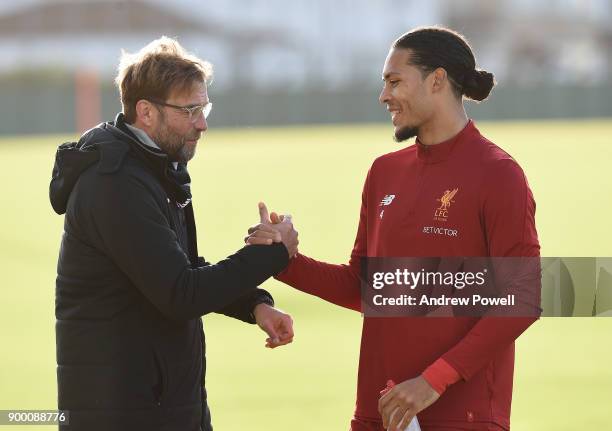 Virgil van Dijk new signing of Liverpool with Jurgen Klopp manager of Liverpool at Melwood Training Ground on December 31, 2017 in Liverpool, England.