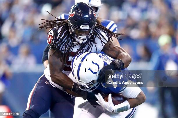 Jadeveon Clowney of the Houston Texans sacks Jacoby Brissett of the Indianapolis Colts during the first half at Lucas Oil Stadium on December 31,...