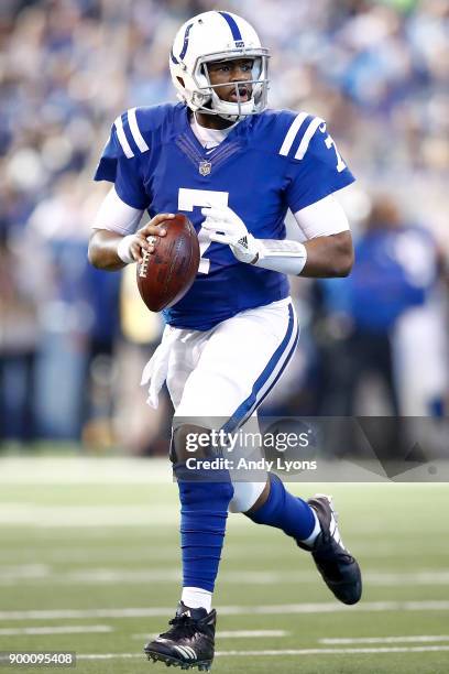 Jacoby Brissett of the Indianapolis Colts looks to pass against the Houston Texans during the first half at Lucas Oil Stadium on December 31, 2017 in...