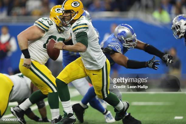 Brett Hundley of the Green Bay Packers runs with the ball against the Detroit Lions during the first quarter at Ford Field on December 31, 2017 in...