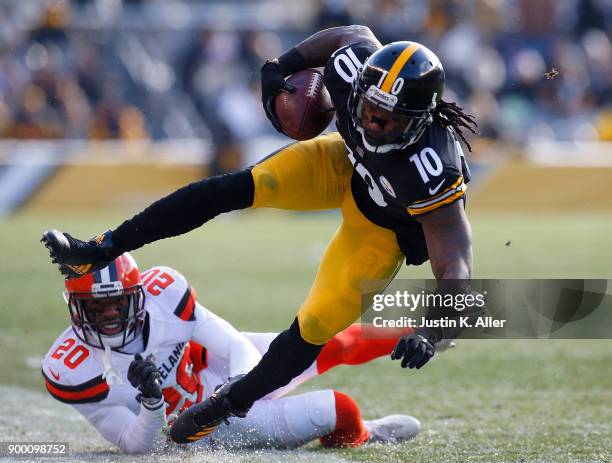 Martavis Bryant of the Pittsburgh Steelers is knocked out of bounds by Briean Boddy-Calhoun of the Cleveland Browns in the second quarter during the...