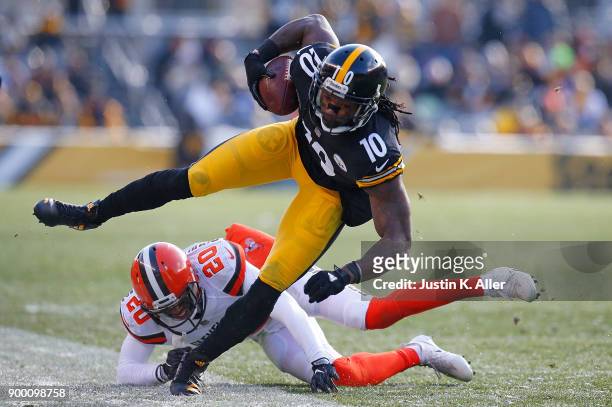 Martavis Bryant of the Pittsburgh Steelers is knocked out of bounds by Briean Boddy-Calhoun of the Cleveland Browns in the second quarter during the...