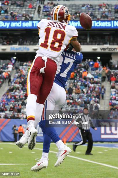 Ross Cockrell of the New York Giants breaks up a pass intended for Josh Doctson of the Washington Redskins during the first half at MetLife Stadium...