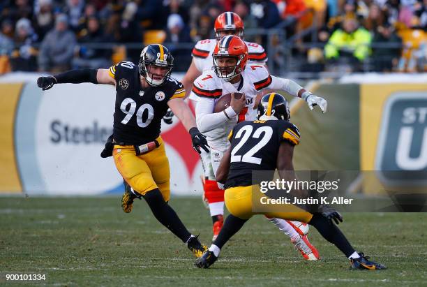 DeShone Kizer of the Cleveland Browns runs up field against William Gay of the Pittsburgh Steelers in the second quarter during the game at Heinz...