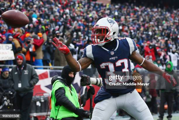 Dion Lewis of the New England Patriots celebrates after scoring a 5-yard receiving touchdown during the second quarter against the New York Jets at...