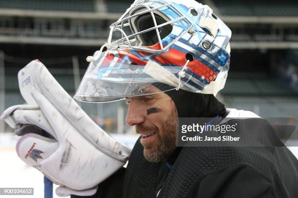 Henrik Lundqvist of the New York Rangers looks on during practice for the 2018 Bridgestone NHL Winter Classic at Citi Field on December 31, 2017 in...