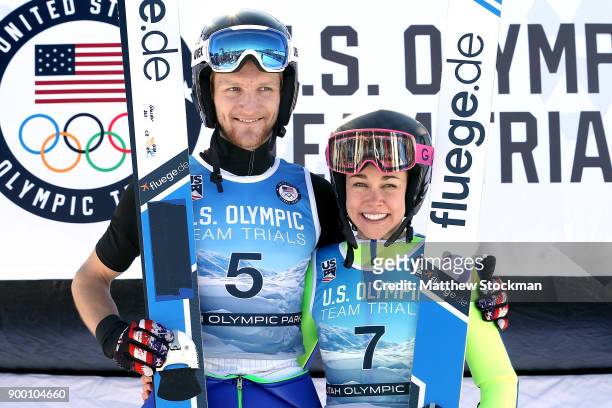 Michael Glasder and Sarah Hendrickson pose on the medals podium after the U.S. Men's and Womens Ski Jumping Olympic Trials on December 31, 2017 at...