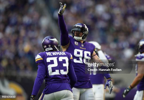 Brian Robison of the Minnesota Vikings celebrates after sacking Mitchell Trubisky of the Chicago Bears in the third quarter of the game on December...