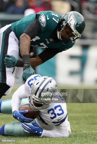 Cornerback Chidobe Awuzie of the Dallas Cowboys picks off a pass intended for wide receiver Alshon Jeffery of the Philadelphia Eagles during the...