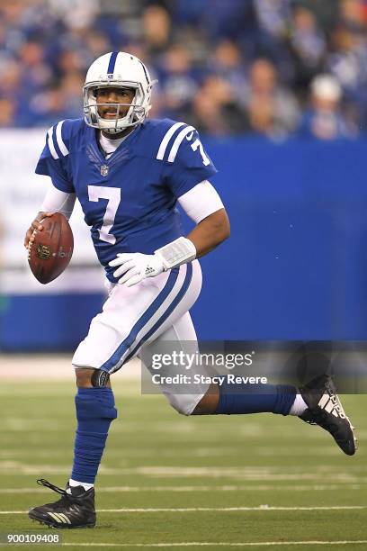 Jacoby Brissett of the Indianapolis Colts looks to pass against the Houston Texans during the second half at Lucas Oil Stadium on December 31, 2017...