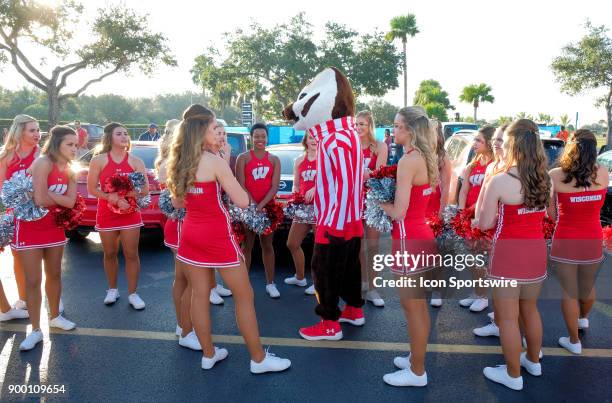 University of Wisconsin Badgers mascot Bucky Badger cheers as the Badgers compete against the University of Miami Hurricanes during the Capital One...