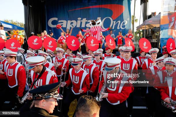 University of Wisconsin Badgers mascot Bucky Badger cheers as the Badgers compete against the University of Miami Hurricanes during the Capital One...