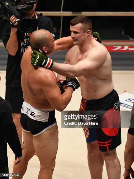Mirko Cro Cop of Croatia shakes hands withTsuyoshi Kosaka of Japan after the bout during the RIZIN Fighting World Grand-Prix 2017 final Round at...