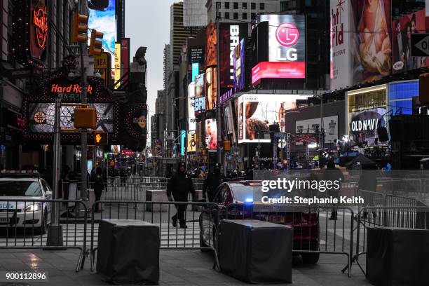 Members of the New York City police department patrol in Times Square ahead of the New Year's Eve celebration on December 31, 2017 in New York City.