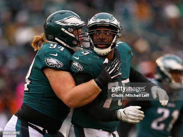 Defensive end Vinny Curry and defensive tackle Beau Allen of the Philadelphia Eagles react against the Dallas Cowboys during the second half of the...
