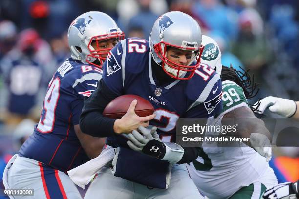 Steve McLendon of the New York Jets sacks Tom Brady of the New England Patriots during the second half at Gillette Stadium on December 31, 2017 in...