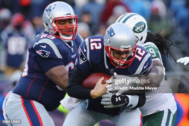 Steve McLendon of the New York Jets sacks Tom Brady of the New England Patriots during the second half at Gillette Stadium on December 31, 2017 in...