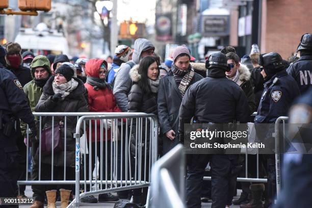 Members of the New York City police department patrol in Times Square ahead of the New Year's Eve celebration on December 31, 2017 in New York City.