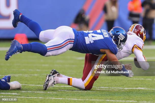 Olivier Vernon of the New York Giants sacks Kirk Cousins of the Washington Redskins during the second half at MetLife Stadium on December 31, 2017 in...