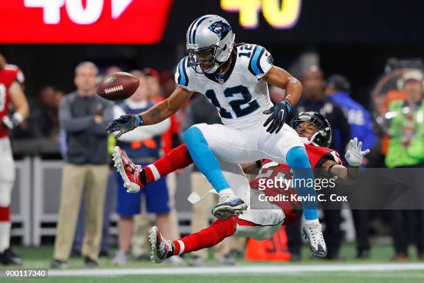 Robert Alford of the Atlanta Falcons breaks up a pass intended for Kaelin Clay of the Carolina Panthers during the first half at Mercedes-Benz...