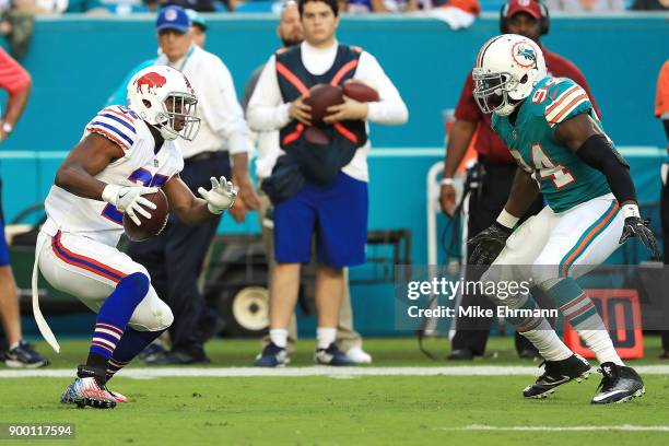 LeSean McCoy of the Buffalo Bills rushes during the second quarter against the Miami Dolphins at Hard Rock Stadium on December 31, 2017 in Miami...