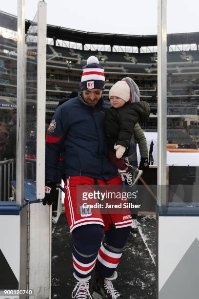 Ryan McDonagh of the New York Rangers takes the ice to skate with his family after practice for the 2018 Bridgestone NHL Winter Classic at Citi Field...