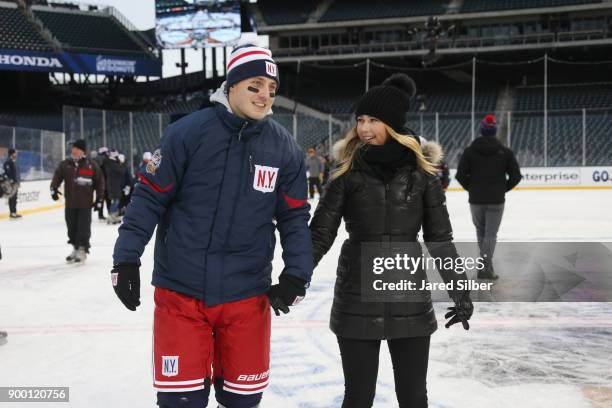 Jesper Fast of the New York Rangers skates with his family after practice for the 2018 Bridgestone NHL Winter Classic at Citi Field on December 31,...