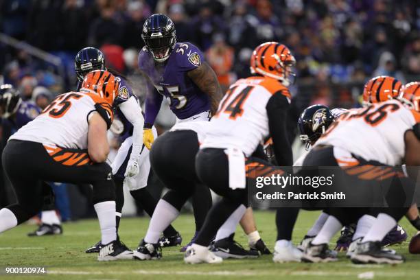 Outside Linebacker Terrell Suggs of the Baltimore Ravens looks on from the line of scrimmage in the first quarter against the Cincinnati Bengals at...