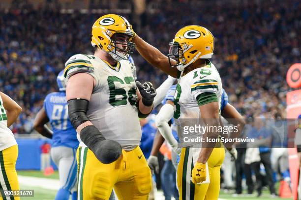 Green Bay Packers wide receiver Randall Cobb celebrates his second half touchdown with Green Bay Packers offensive lineman Lucas Patrick during a NFL...