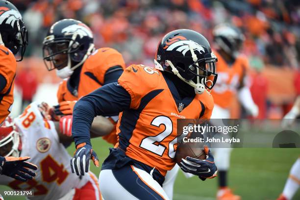 Denver Broncos free safety Darian Stewart runs back and interception during the first quarter against the Kansas City Chiefs on December 31, 2017 in...