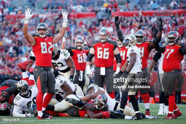 Peyton Barber of the Tampa Bay Buccaneers scores on a one-yard run against the New Orleans Saints in the first quarter of a game at Raymond James...