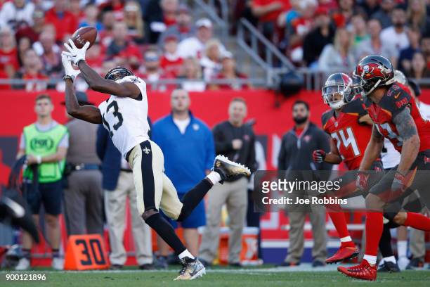 Michael Thomas of the New Orleans Saints makes a 43-yard reception behind the defense in the first quarter of a game against the Tampa Bay Buccaneers...