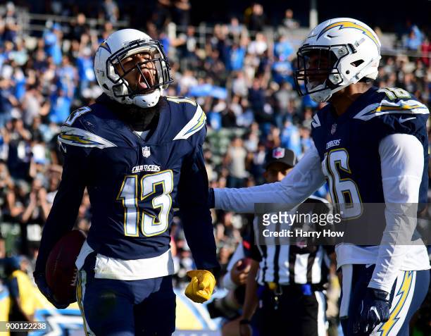 Keenan Allen of the Los Angeles Chargers reacts to his touchdown catch in front of Tyrell Williams to take a 20-10 lead over the Oakland Raiders...