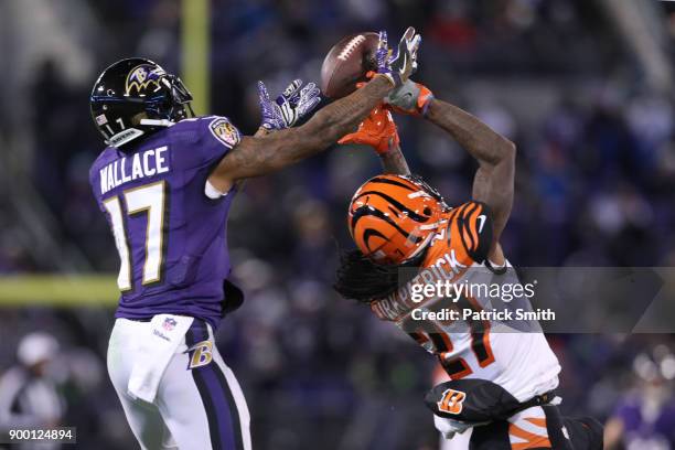 Cornerback Dre Kirkpatrick of the Cincinnati Bengals breaks up a pass for wide receiver Mike Wallace of the Baltimore Ravens in the second quarter at...