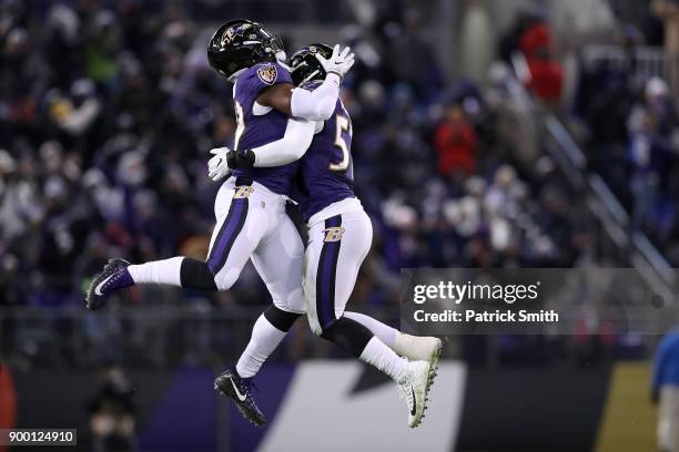 Outside Linebacker Matt Judon and inside linebacker C.J. Mosley of the Baltimore Ravens react after a play in the second quarter against the...