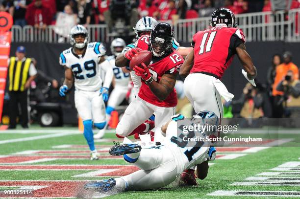 Mohamed Sanu of the Atlanta Falcons fails to make a catch for a touchdown during the second half against the Carolina Panthers at Mercedes-Benz...