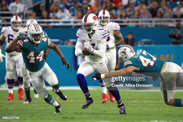 Tyrod Taylor of the Buffalo Bills rushes during the second quarter against the Miami Dolphins at Hard Rock Stadium on December 31, 2017 in Miami...