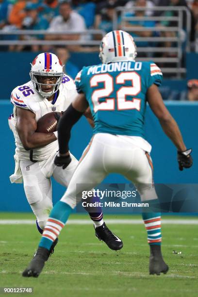 Charles Clay of the Buffalo Bills carries the ball during the second quarter against the Miami Dolphins at Hard Rock Stadium on December 31, 2017 in...