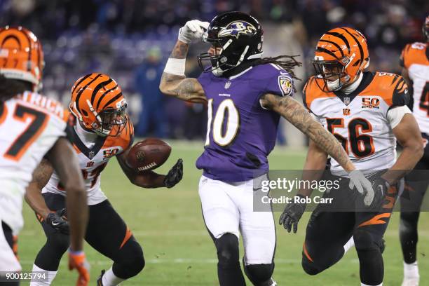 Cornerback Darqueze Dennard of the Cincinnati Bengals intercepts a pass in the third quarter against the Baltimore Ravens at M&T Bank Stadium on...