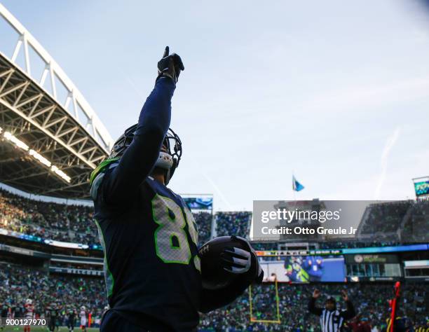 Wide receiver Doug Baldwin of the Seattle Seahawks celebrates his 18 yard touchdown in the third quarter during the game against the Arizona...