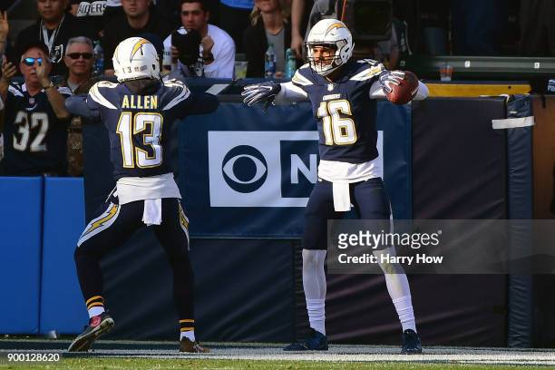 Tyrell Williams of the Los Angeles Chargers celebrates his touchdown with teammate Keenan Allen to take a 14-10 lead during the second quarter of the...