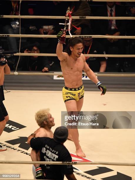Yusuke Yachi of Japan celebrates his submission victory against Takanori Gomi of Japan in the bout during the RIZIN Fighting World Grand-Prix 2017...